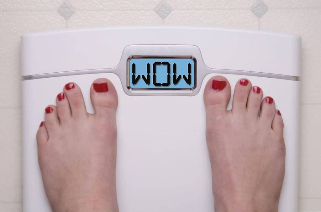 a person's feet on a scale